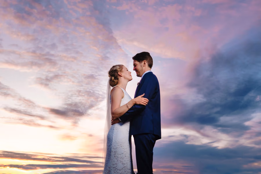 Bride and groom in evening light during a wedding in Sweden